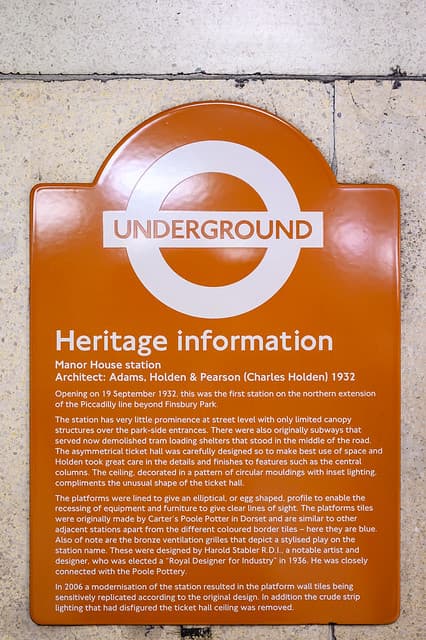 Charles Holden brown plaque