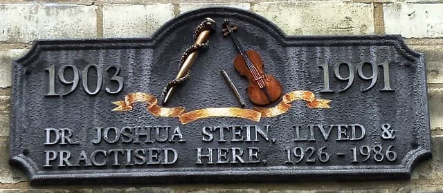 Joshua Stein black plaque