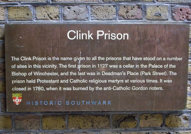 The Clink brown plaque