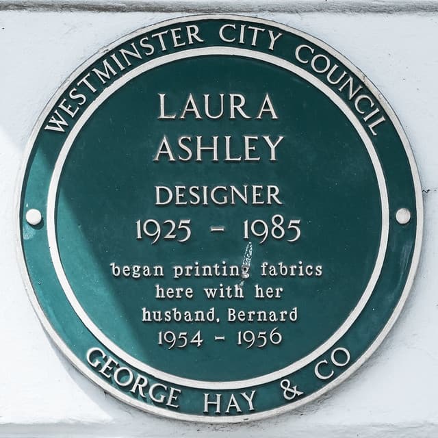 Laura Ashley and Bernard Ashley green plaque