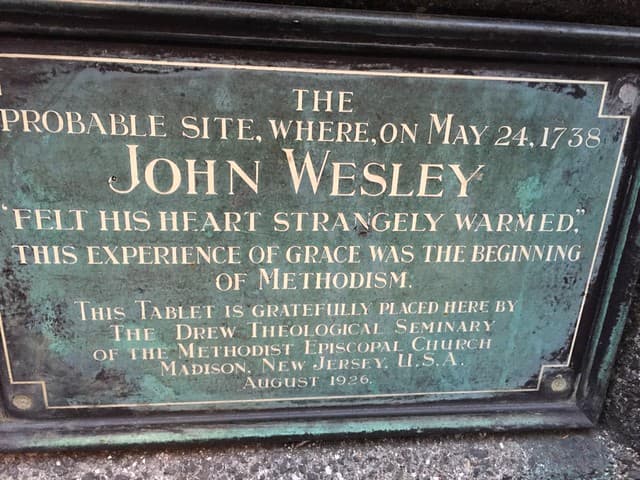 John Wesley black plaque