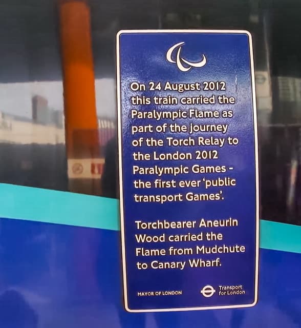 Aneurin Wood and Paralympic Flame blue plaque