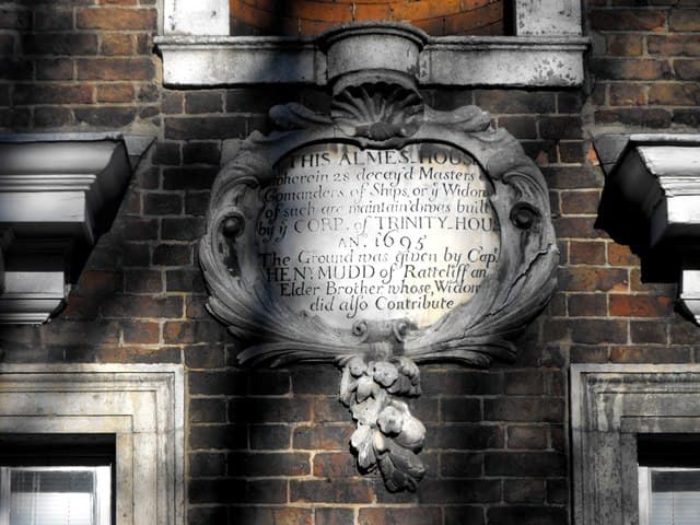 Trinity Green Almeshouses stone plaque